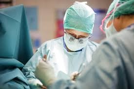 Women Preforming Surgery